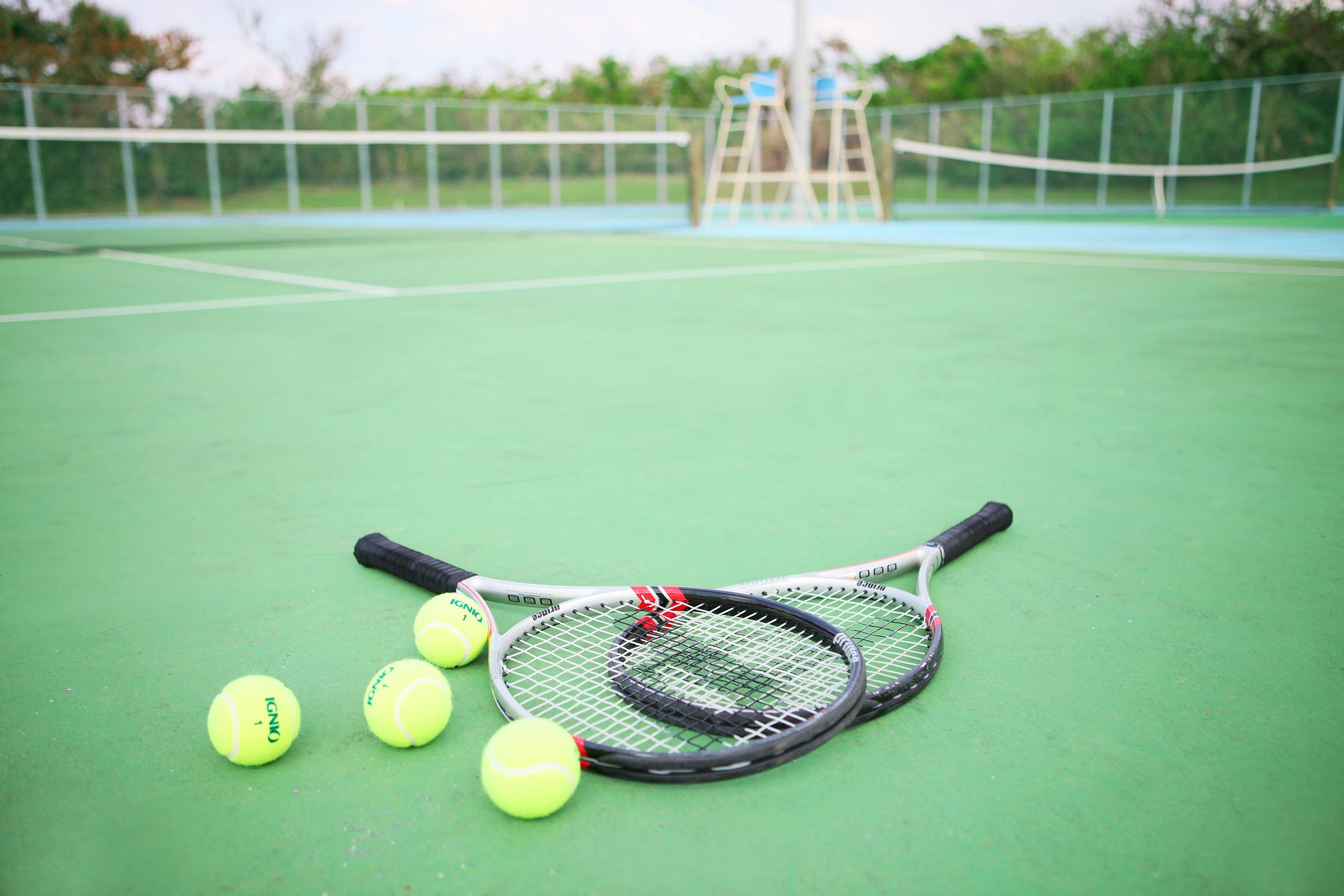 Hotel Nikko Alivila Yomitan Exterior photo Tennis balls and racquets